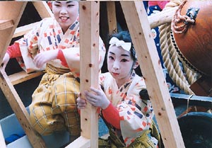金棒引きの少女